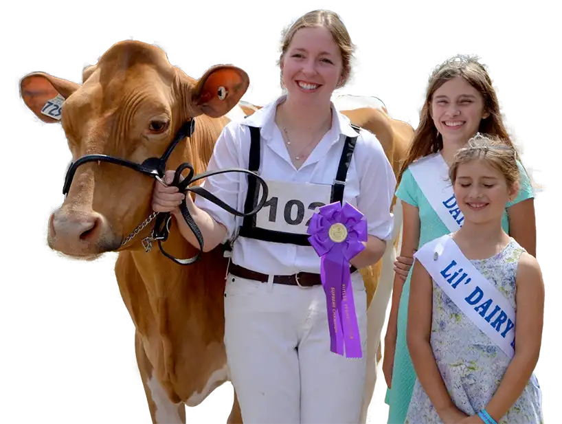 Butler Farm Show dairy princesses with a prize cow